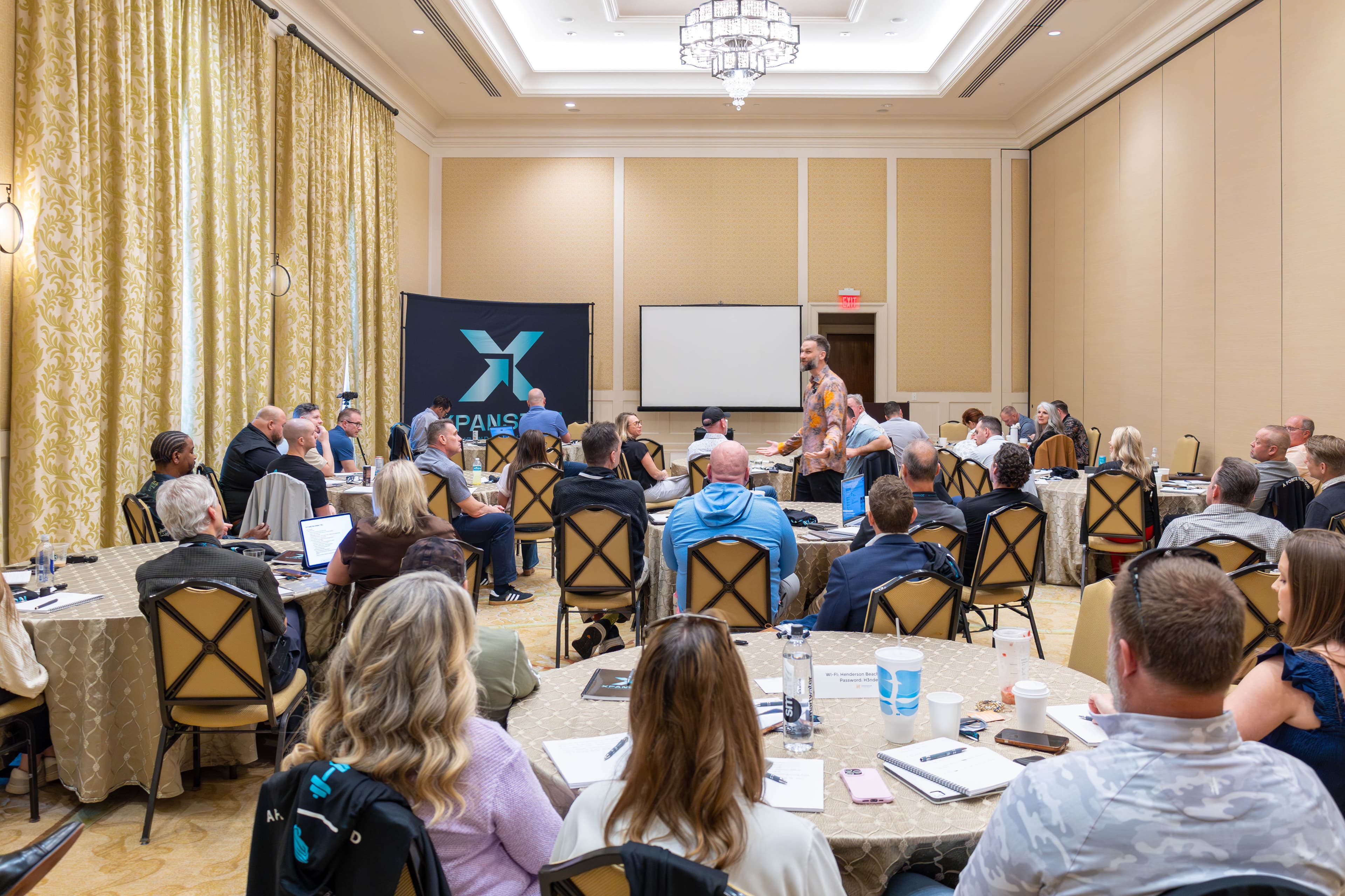 Full room presentation with Xpansion banner