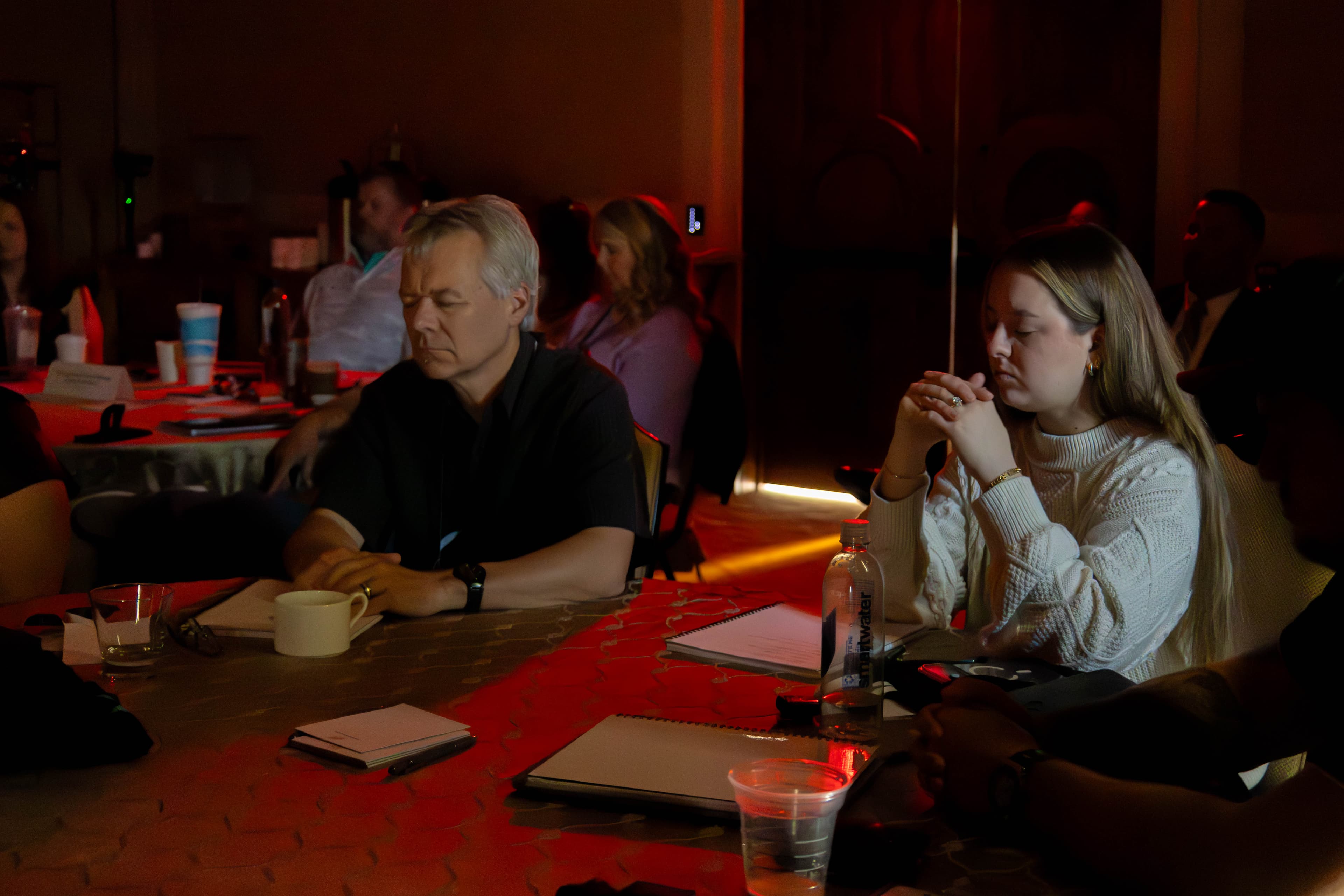 Attendees in focused contemplation